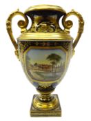 19th century Continental two-handled porcelain vase, urn form with painted scene of a stately home,