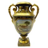 19th century Continental two-handled porcelain vase, urn form with painted scene of a stately home,