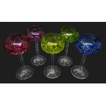Set of five Val St Lambert harlequin cut hock glasses on hexagonal faceted stems and star cut foot,