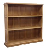 Bob 'Wrenman' Hunter oak bookcase, adzed top with raised back carved with signature Wren,