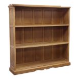 Bob 'Wrenman' Hunter oak bookcase, adzed top with raised back carved with signature Wren,