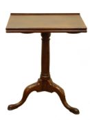 George IIl mahogany reading table, hinged top with adjustable stay, and candle stands,