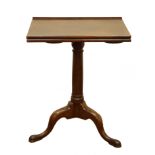 George IIl mahogany reading table, hinged top with adjustable stay, and candle stands,