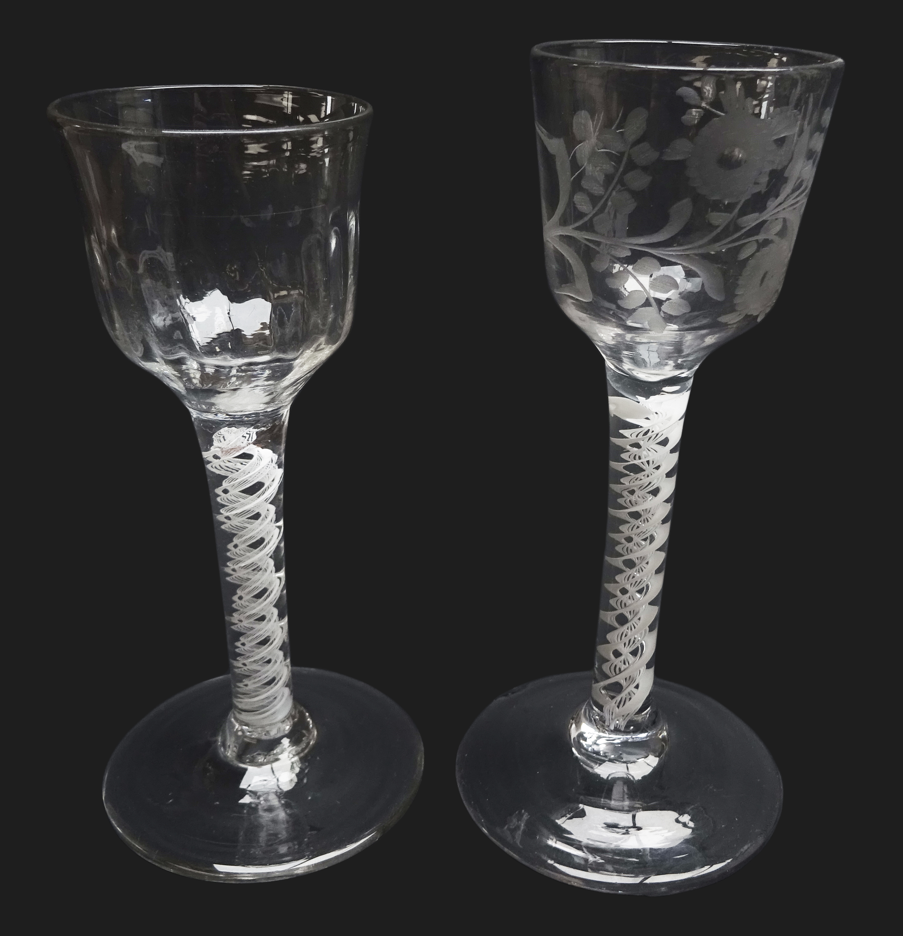 Georgian wine glass, semi-wrythen fluted ogee bowl above a opaque twist stem,