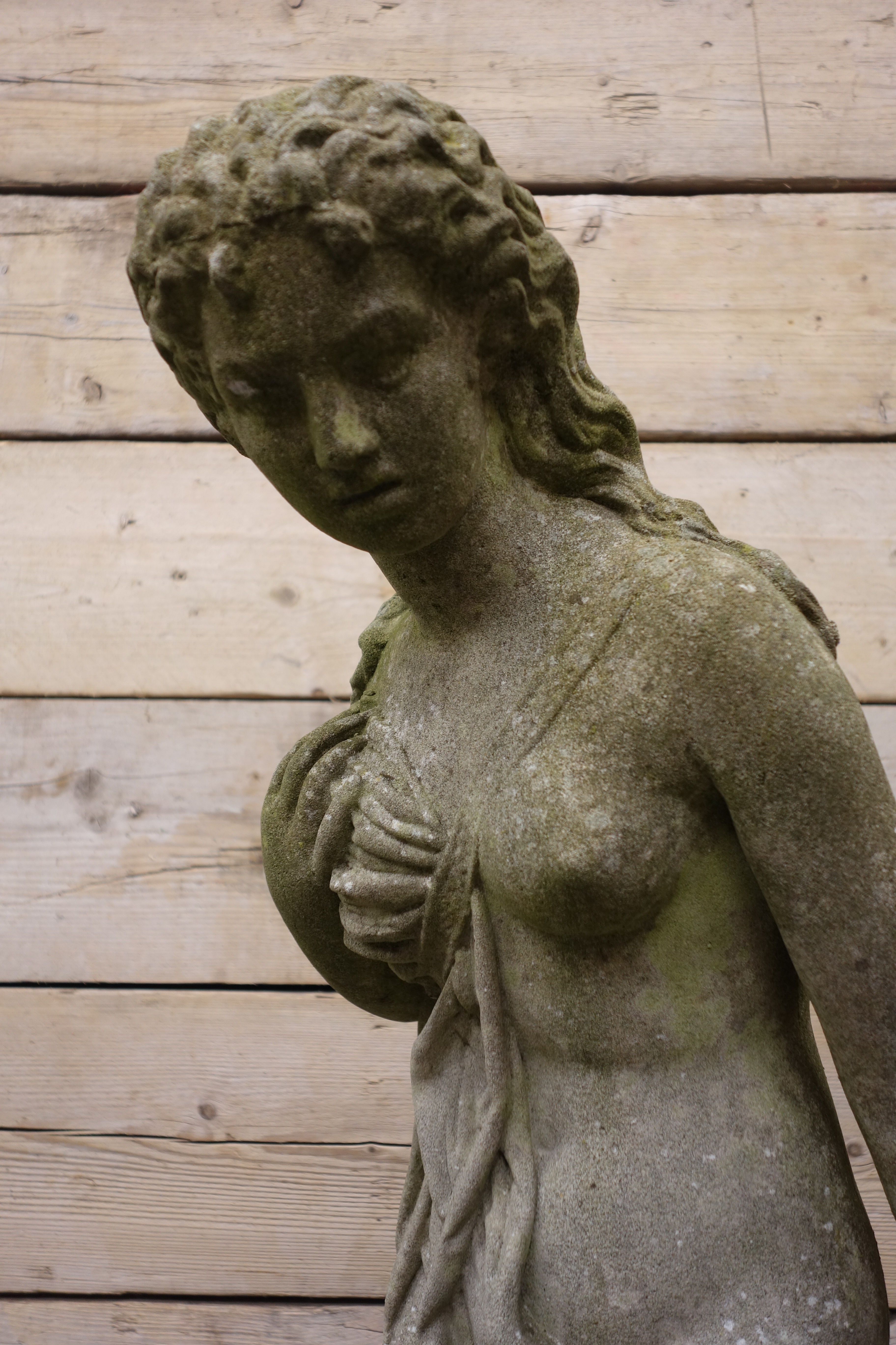 Composite stone garden sculpture of a semi-clad young Lady, on naturalistic circular base, - Image 4 of 4