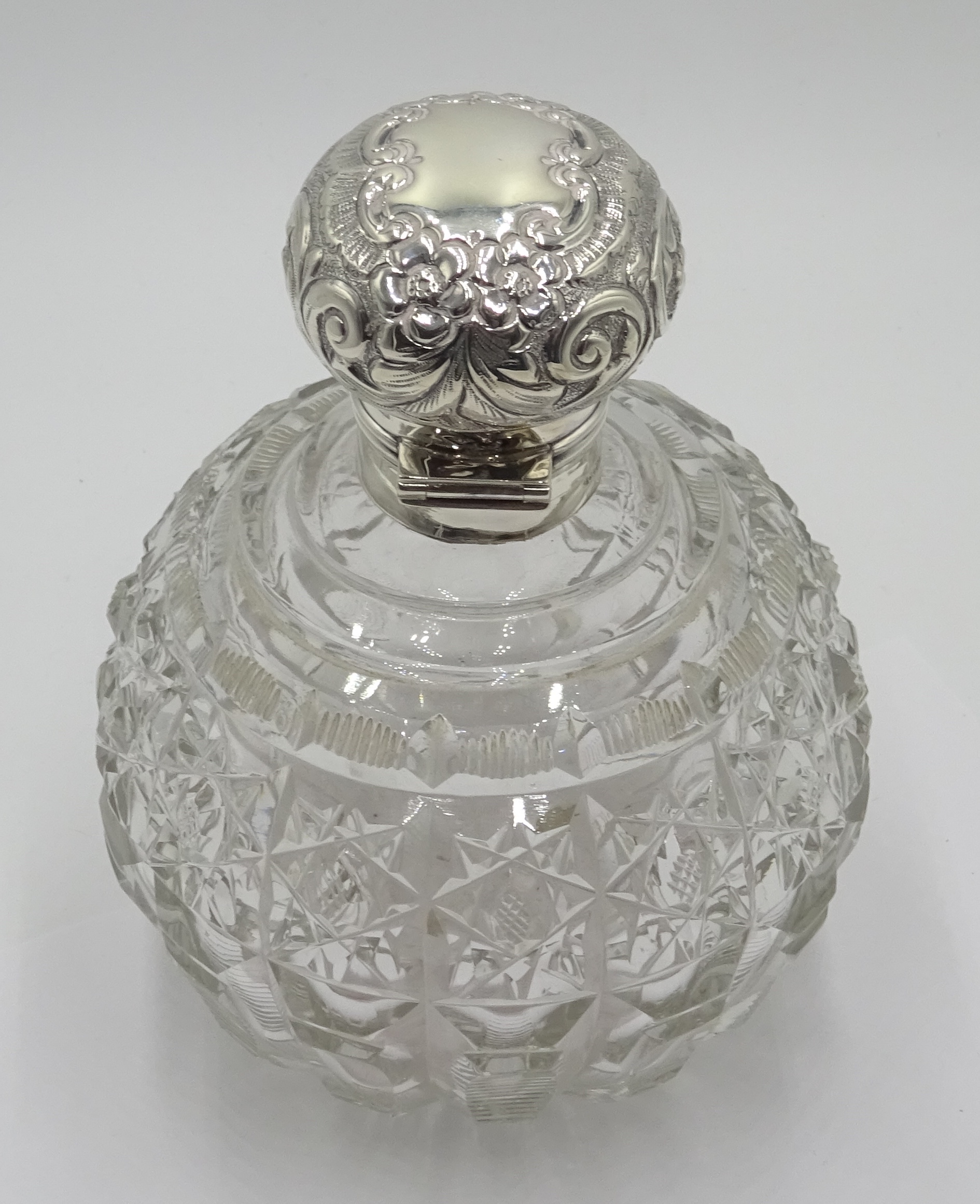 Edwardian silver mounted globular cut glass scent bottle decorated with embossed flowers and - Image 5 of 5