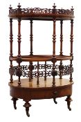 Victorian figured walnut oval Canterbury, pierced galleried top with turned finials,
