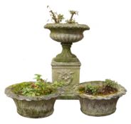Composite stone circular garden urn, with lobed body on wreath moulded pedestal, H78cm,