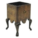 Queen Anne style figured walnut square jardiniere, shaped frieze on cabriole legs with hoof feet,