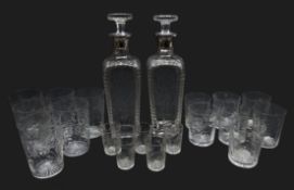 Pair Edwardian Thomas Webb & Sons silver mounted decanters,