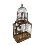 Victorian style bird cage of architectural dome shaped form,