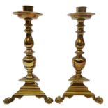 Pair 18th century Dutch brass candlesticks, circular drip pan,