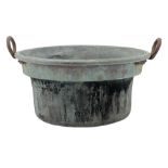 20th century copper circular two-handled cheese vat, with stepped interior and cast iron handles,
