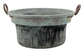 20th century copper circular two-handled cheese vat, with stepped interior and cast iron handles,