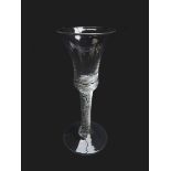 Georgian wine glass, bell shaped bowl, air twist stem and domed foot,