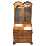 Queen Anne style style walnut double dome top bureau bookcase,