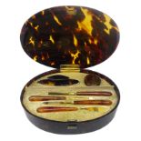 George V tortoiseshell manicure set, containing six implements,