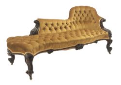 Victorian walnut framed chaise lounge, with carved scrolled acanthus leaf arm terminals,