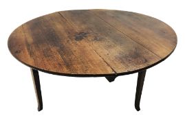 Early 19th century country oak oval drop leaf dining table,
