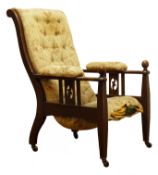 Arts & Crafts oak armchair, upholstered back, seat and arm pads, pierced and railed side panels,