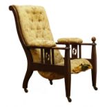 Arts & Crafts oak armchair, upholstered back, seat and arm pads, pierced and railed side panels,