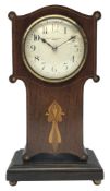 Art Nouveau inlaid mahogany serpentine top mantel timepiece,