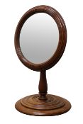 Victorian mahogany adjustable toilet mirror, circular plate in reeded surround,