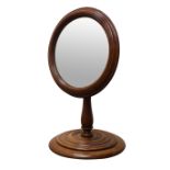 Victorian mahogany adjustable toilet mirror, circular plate in reeded surround,