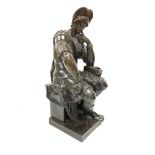 After the Antique: 'Lorenzo de' Medici' a bronze of a Roman soldier seated on a stone column,