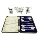 Set of six silver apostle spoons and nips cased, sauce boat and two cream jugs 10.