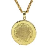 Gold circular locket pendant on gold cable link chain necklace,