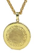 Gold circular locket pendant on gold cable link chain necklace,
