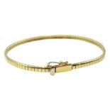 14ct gold hinged flexible bangle stamped 14K,