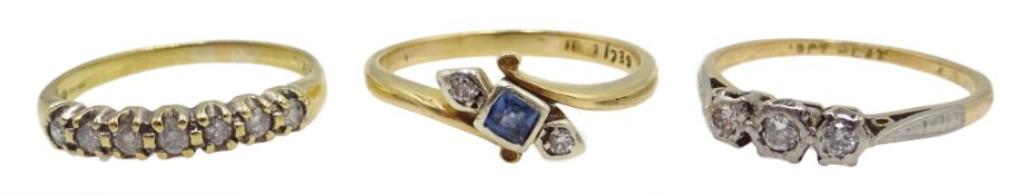 Gold sapphire and diamond crossover ring and three stone diamond ring,