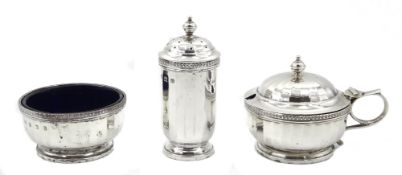 Silver three piece condiment set with blue glass liners by Walker & Hall Birmingham 1928, 4.