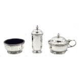 Silver three piece condiment set with blue glass liners by Walker & Hall Birmingham 1928, 4.