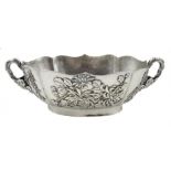 Chinese export silver bowl in the Japanese style circa 1900, decorated in relief with iris,