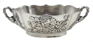Chinese export silver bowl in the Japanese style circa 1900, decorated in relief with iris,