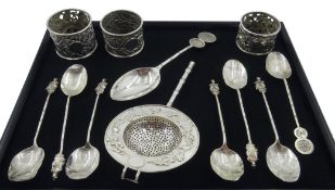 Chinese export silver tea strainer with applied prunus blossom decoration and bamboo shape handle