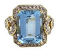 18ct gold emerald cut aquamarine and diamond dress ring,