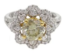 18ct white gold diamond flower cluster ring, the central fancy brilliant cut diamond of approx 1.