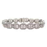 Platinum old brilliant cut and baguette cut diamond line bracelet by Sophia D, stamped Plat,