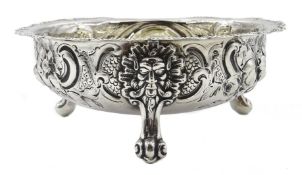 Silver bon bon dish embossed floral decoration on three lion mask scroll feet by Robert Harper 1872