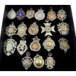 Collection of nineteen Victorian and later hallmarked silver sporting watch fob medals 6.