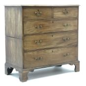Georgian mahogany chest, two short and three long cockbeaded drawers, shaped bracket supports,