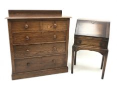 Early 20th century oak chest, raised back, two short and three long drawers, plinth base (W107cm,