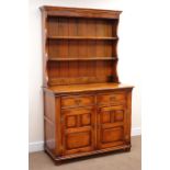 Medium oak dresser, two tier plate rack above two drawers and two panelled doors, by 'S. Cumper Ltd.