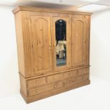 Large pine three door combination wardrobe, projecting cornice, three doors,