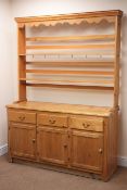 Solid pine dresser, raised back two tier plate rack above three drawers and cupboards, W138cm,