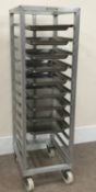 Row Fabrications twelve tier portable racking system with nine trays, W50cm, H156cm,